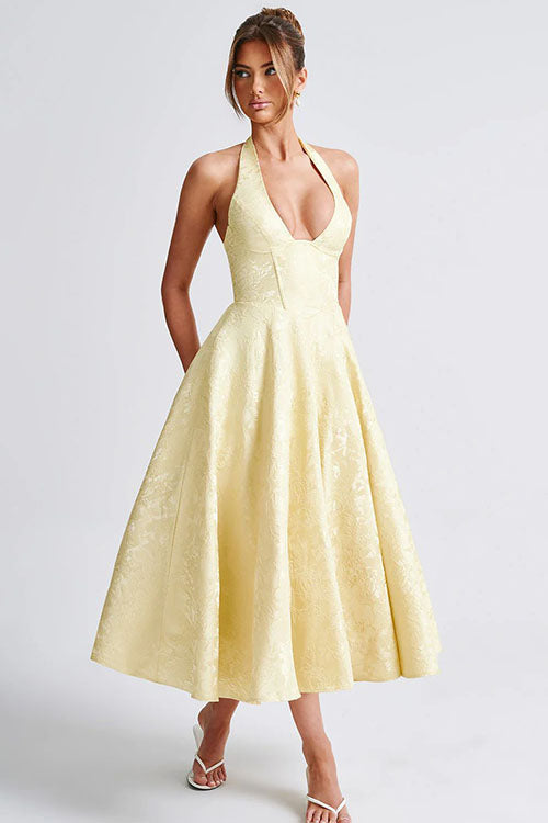 Graceful women's special occasion dress, elegant halterneck maxi style.