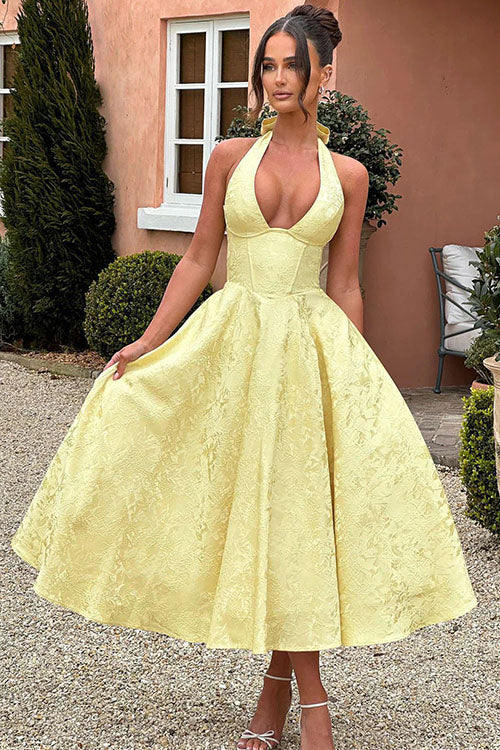 Graceful women's prom dress, A-line silhouette, elegant halterneck design.