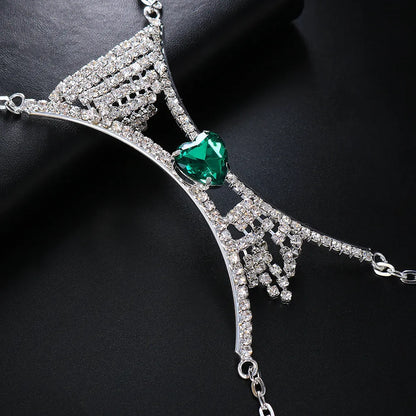 Glamorous women's heart crystal chest body chain, an elegant rhinestone jewelry accessory perfect for parties.