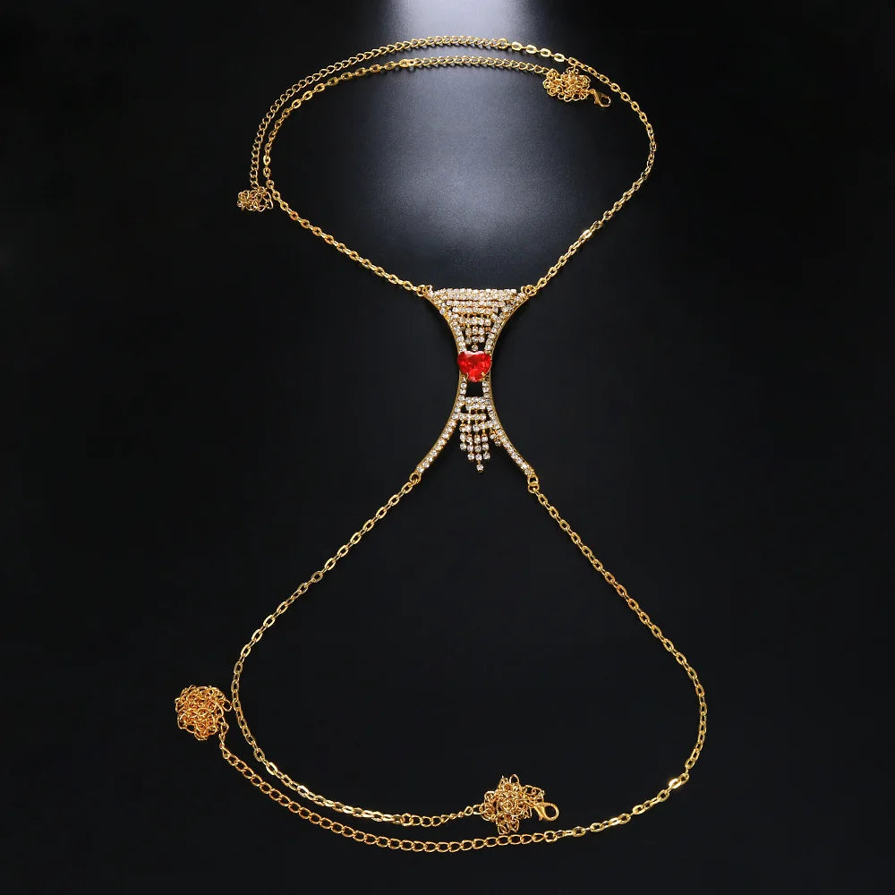 Glam women's heart crystal chest body chain, a dazzling rhinestone jewelry accessory for elegant party statements.