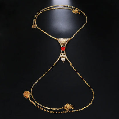 Glam women's heart crystal chest body chain, a dazzling rhinestone jewelry accessory for elegant party statements.