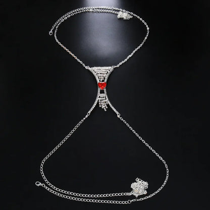 Women's heart crystal chest body chain accessory, elegant rhinestone jewelry for a glamorous party statement.
