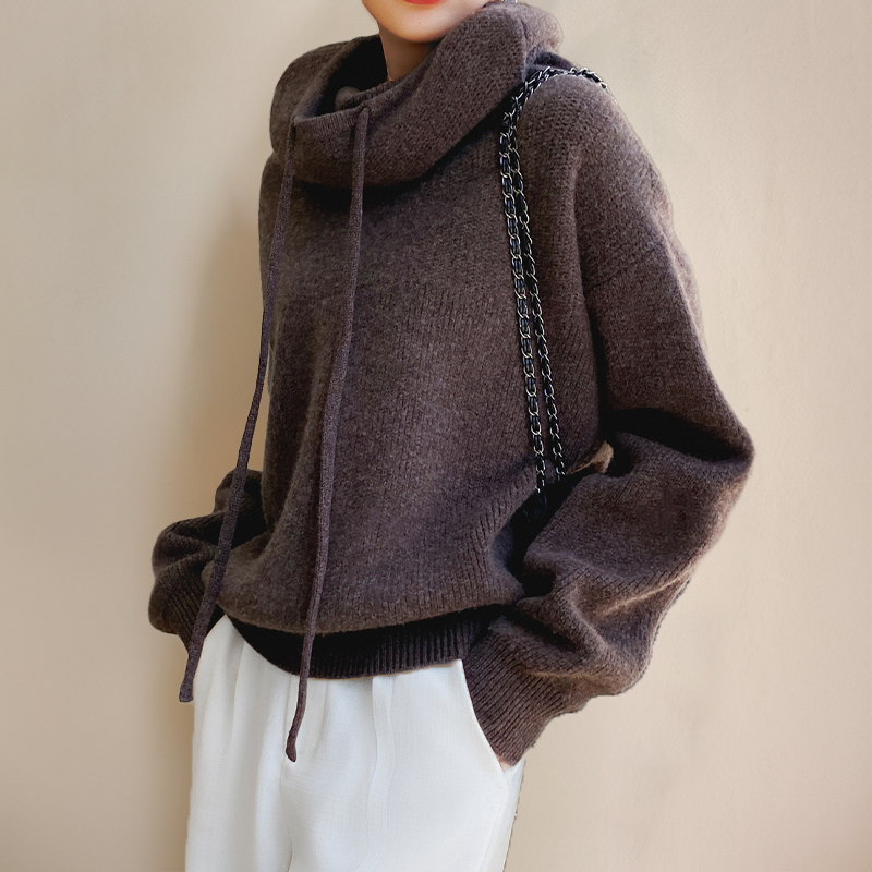 Women's versatile high-neck turtleneck top for everyday wear, offering casual chic comfort in sage green.