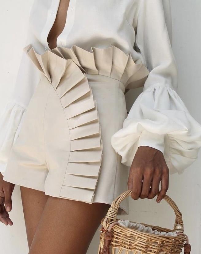 Elegant women's high-waist ruffle shorts, perfect for summer casual or chic fashion.