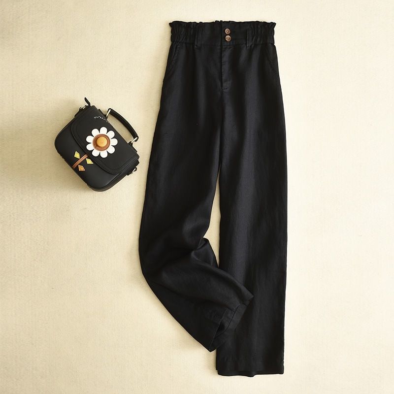 Comfortable women's wide-leg pants with a high-waist and subtle ruffled detail, ideal for smart casual wear.