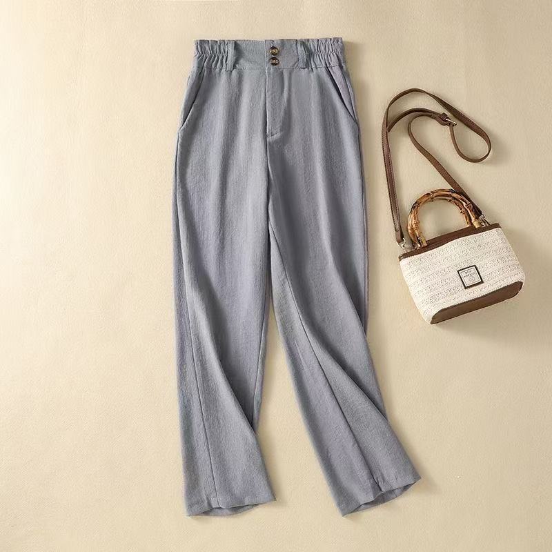 Chic women's high-waist wide-leg trousers, offering elegant comfort for both casual outings and spring fashion.