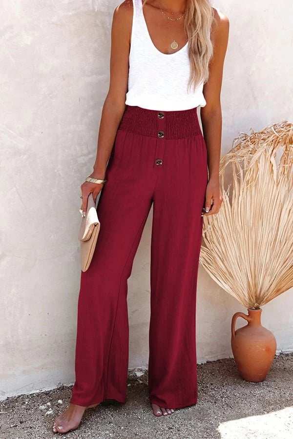 Chic white high-waisted tailored pants for women, ideal for a comfortable yet elegant summer look.