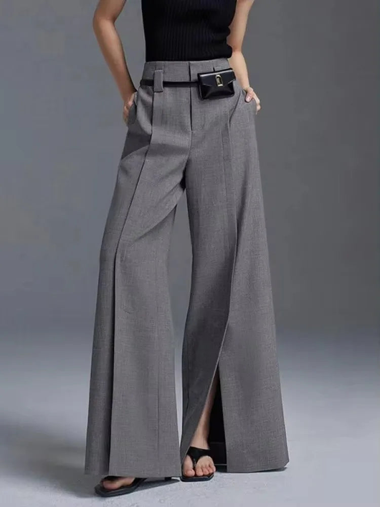 Stylish high-waisted wide-leg trousers for women. Versatile design suitable for elegant evening or professional office wear.