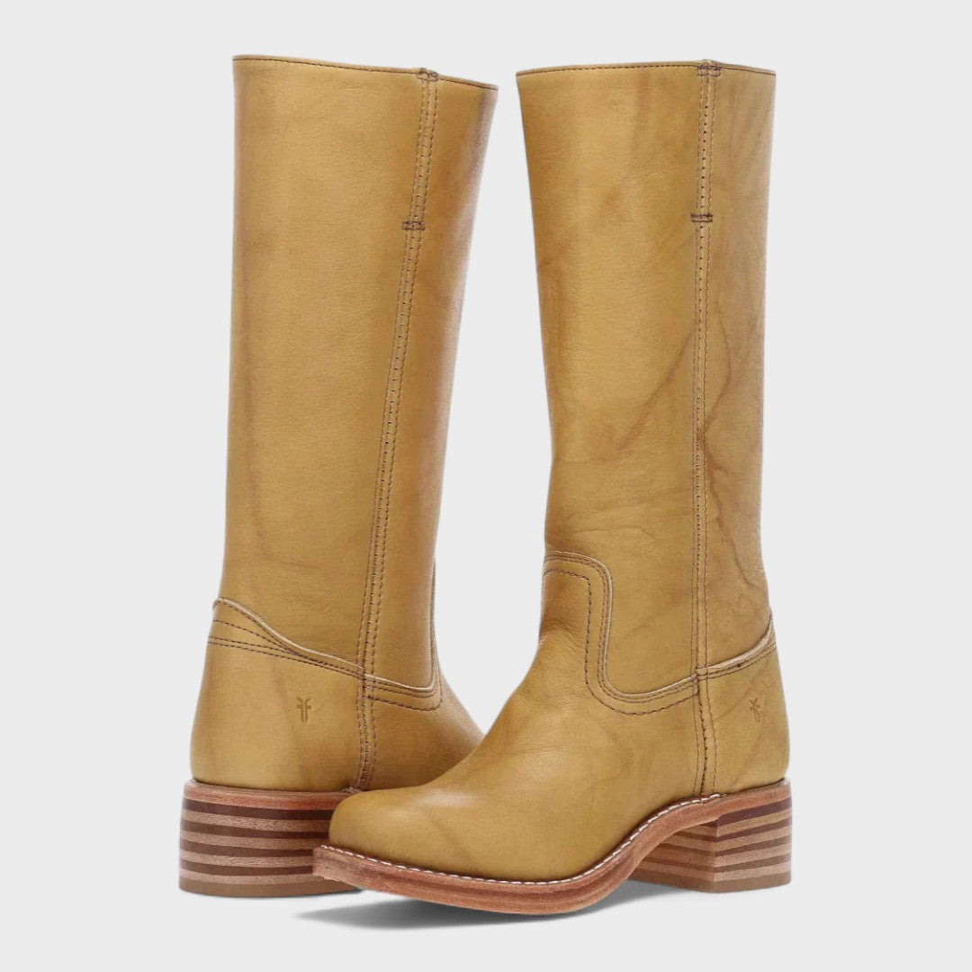 Black women's timeless equestrian fashion boots, offering comfortable knee-high elegance for winter.