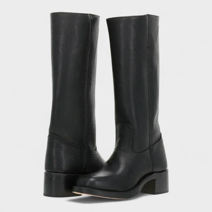 Classic brown women's knee-high equestrian boots for elegant fall and winter fashion, comfort-focused.