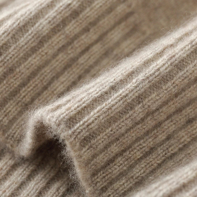 Timeless women's long-sleeve knit cardigan. Refined, comfortable layering piece for elegant, chic fashion.