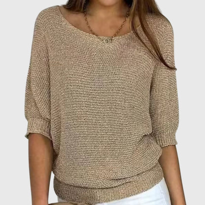 Chic women's long sleeve sweater in a soft knit, perfect for elegant casual winter style. Womenswear fashion.