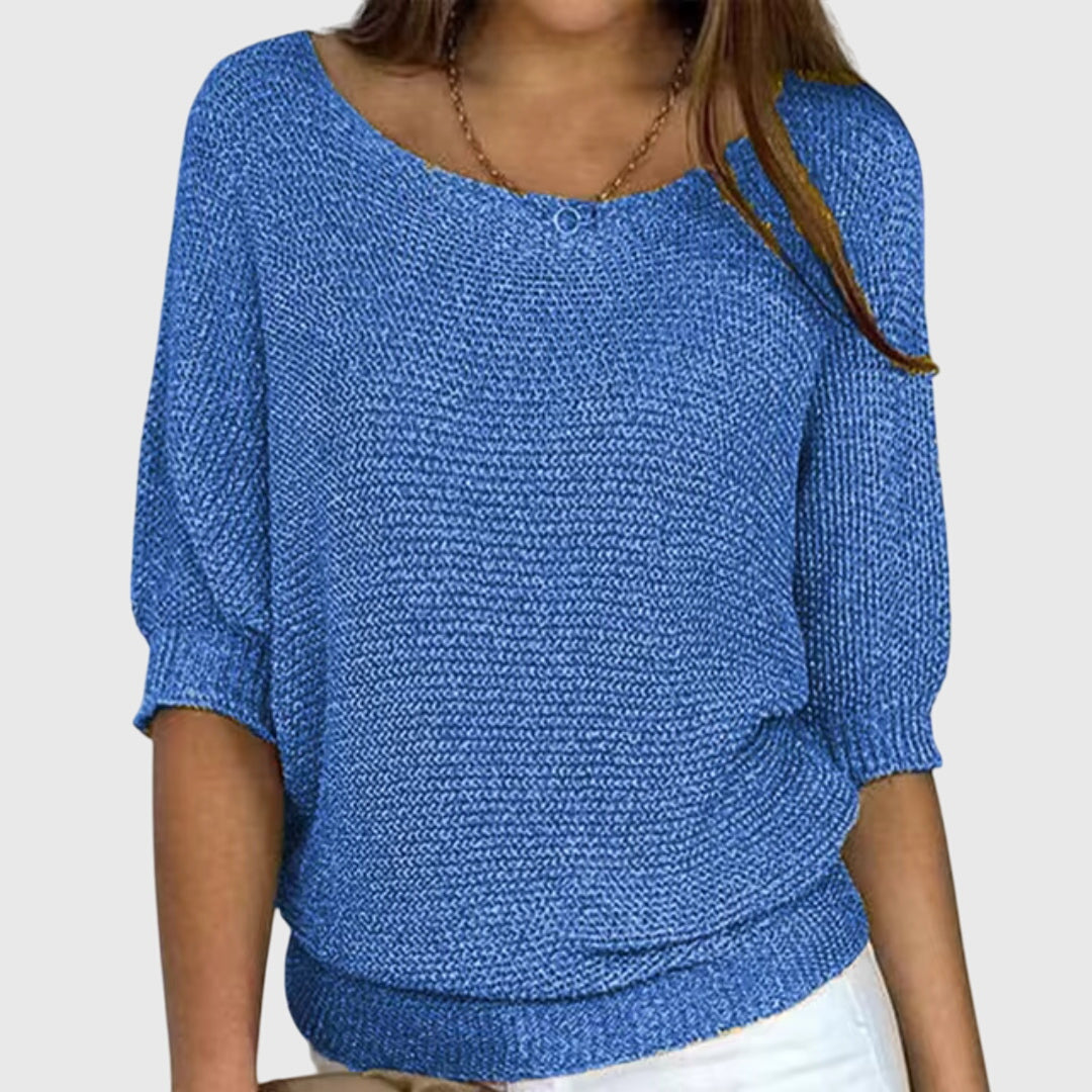 Soft knit elegant women's sweater, offering cozy comfort & chic style for winter and fall fashion. Long sleeves.