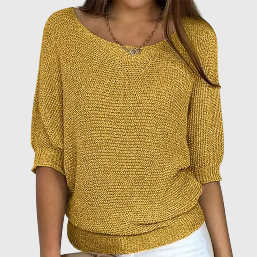 Versatile women's long sleeve knit sweater, providing elegant style & cozy comfort for fall/winter fashion.