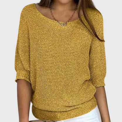 Versatile women's long sleeve knit sweater, providing elegant style & cozy comfort for fall/winter fashion.