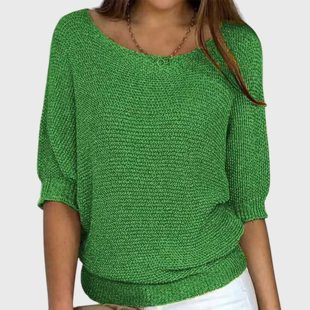 Elegant women's knit sweater, a cozy long sleeve design perfect for chic fall and winter womenswear fashion.