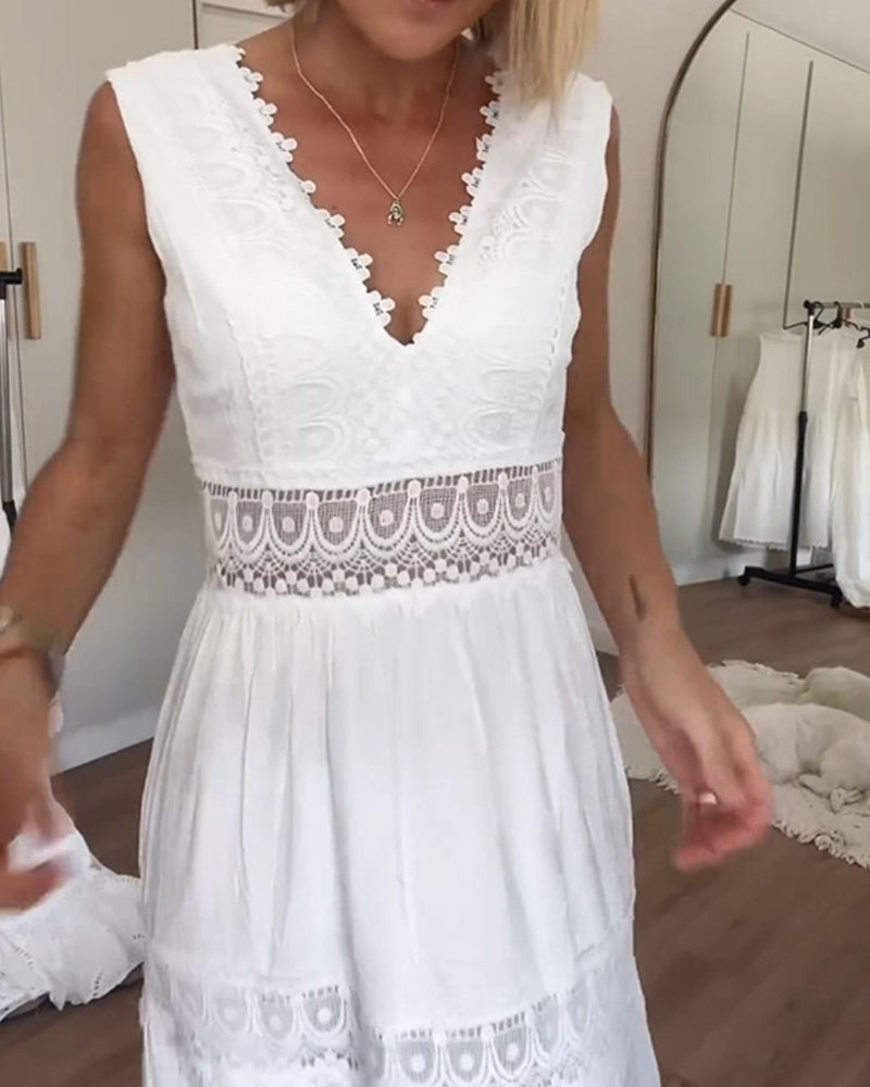 Beautiful women's elegant lace midi dress with a V-neck. A versatile A-line sleeveless summer dress for any occasion.