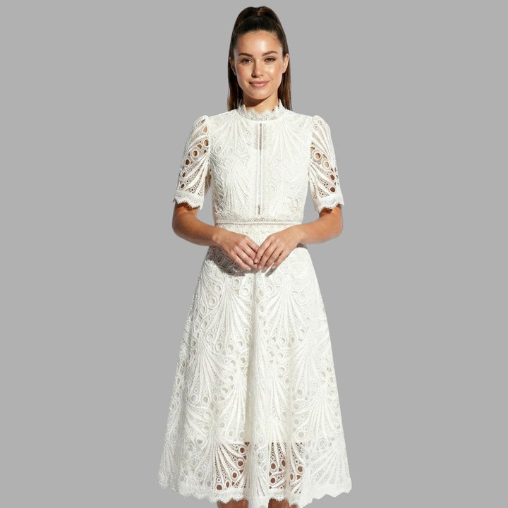 Sophisticated women's midi dress featuring delicate lace & short sleeves. Ideal for elegant formal wear, parties & evening occasions.