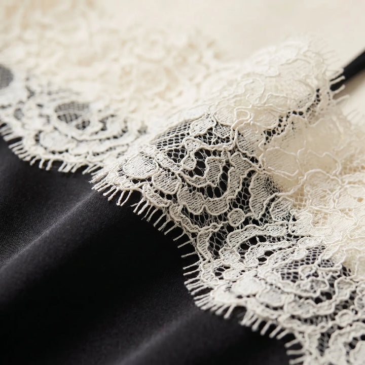 Chic women's sleeveless camisole top featuring intricate lace detailing. Soft fabric, perfect for elegant layering.