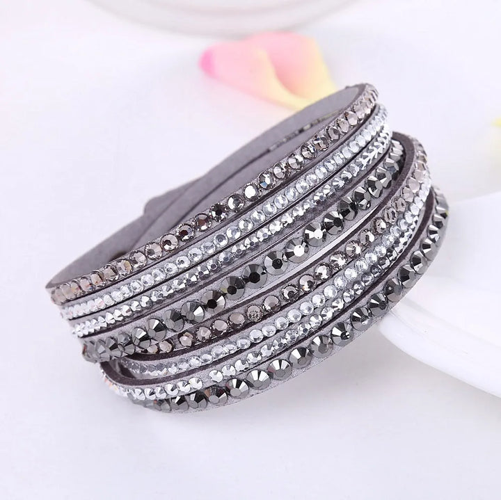 Adjustable layered wrap bracelet for women, featuring dazzling rhinestones for an elegant look.