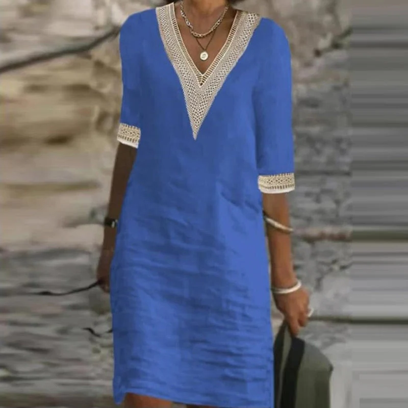 Chic women's linen summer dress for elegant comfort. Versatile midi style for beach or casual wear.