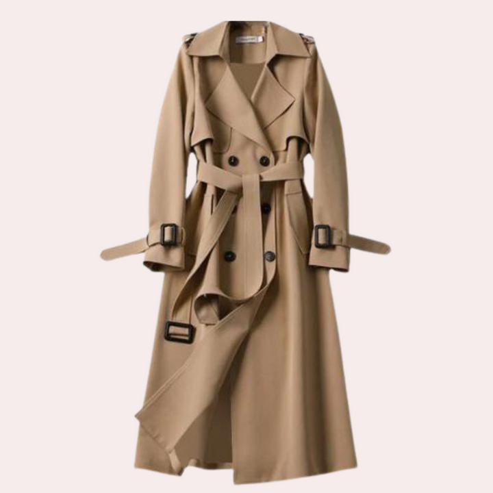 Close-up of the double-button detail on an elegant women's long coat, highlighting the tailored fit.