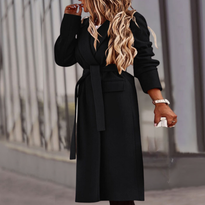 Stylish black women's long jacket. Elegant belted maxi coat, ideal for sophisticated day to night wear.