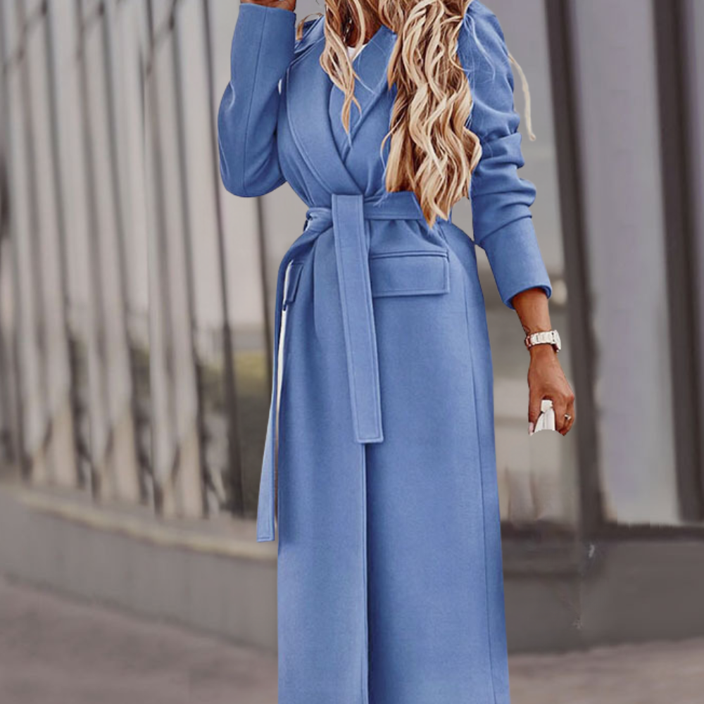 Comfortable blue women's belted maxi coat. Versatile long outerwear for elegant, all-day fashion.