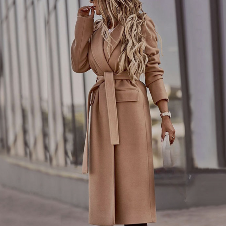 Khaki women's long belted jacket. Elegant maxi outerwear, a versatile coat for sophisticated style.