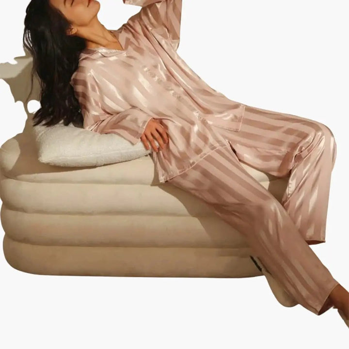 Chic women's long sleeve 2-piece pajama set, versatile as elegant loungewear or comfortable sleepwear.
