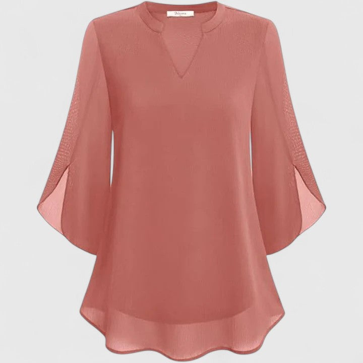 Women's elegant long sleeve top, great for professional office attire or fashionable evening wear.