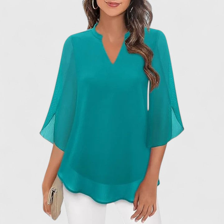 Women's elegant long sleeve blouse for a sophisticated office look or stylish evening fashion.