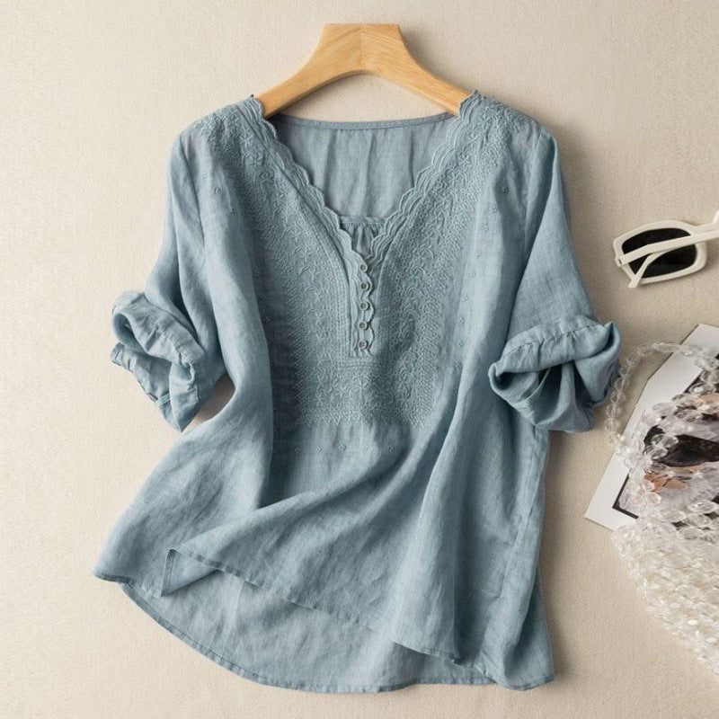 Flowy women's embroidered button-up blouse, relaxed fit, perfect versatile summer top for casual or chic outfits.