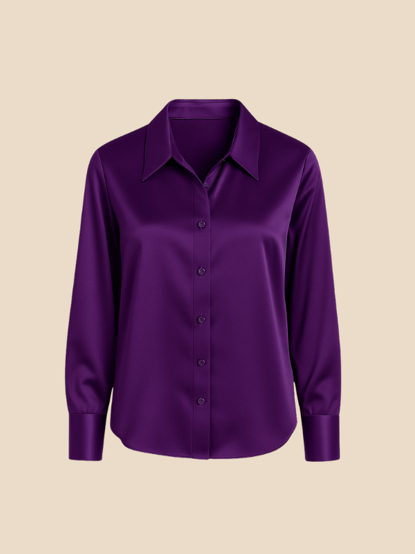 Stylish women's long sleeve button-up top, offering a chic and professional vibe.