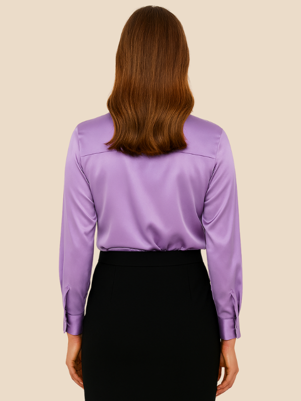 Elegant women's button-front blouse with long sleeves, versatile for fashion.