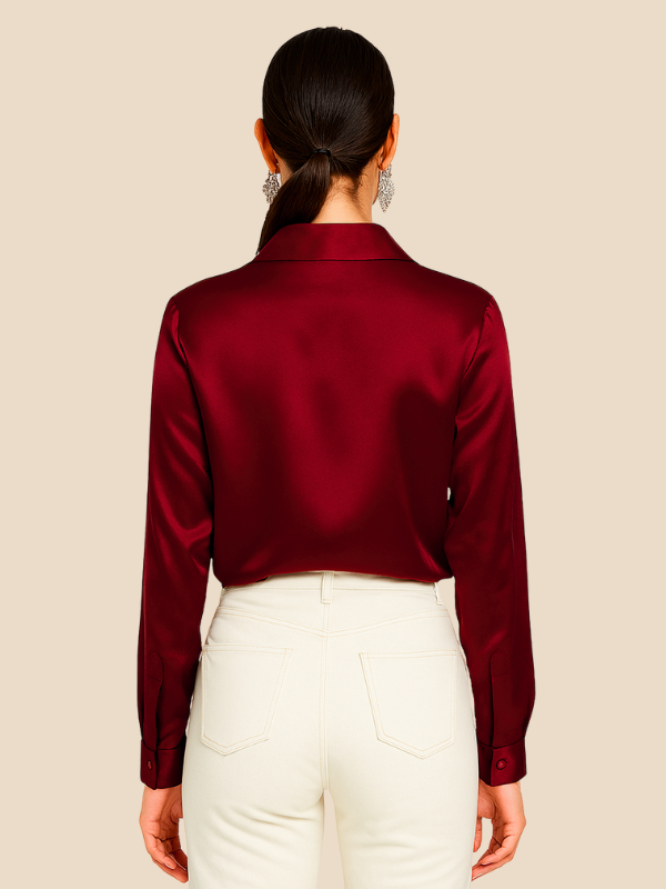 Women's chic long sleeve button-front top, a stylish addition to any outfit.
