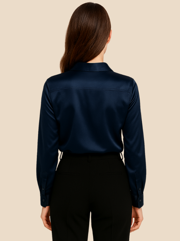 Women's long sleeve button-down blouse, combining elegance with practical design.