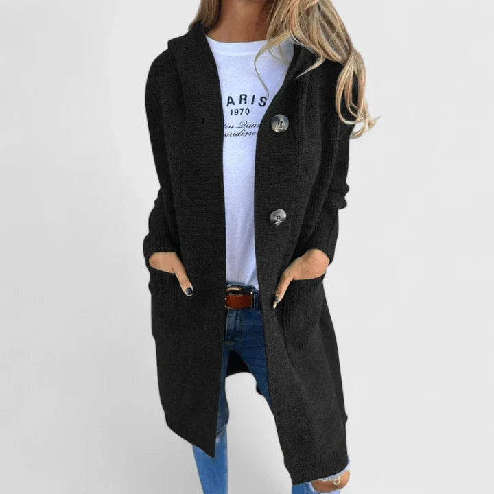 Women's elegant long sleeve cardigan featuring practical pockets, offering comfortable and chic versatile layering.