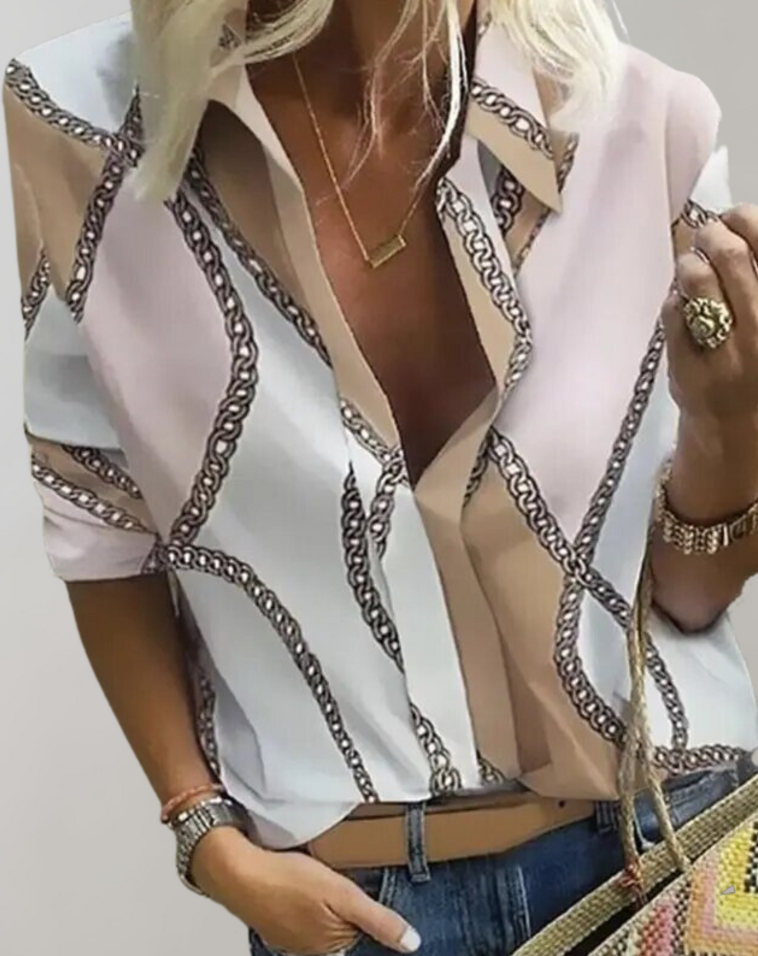 Women's tailored long sleeve blouse with a chic chain print, versatile for professional office and casual outfits.