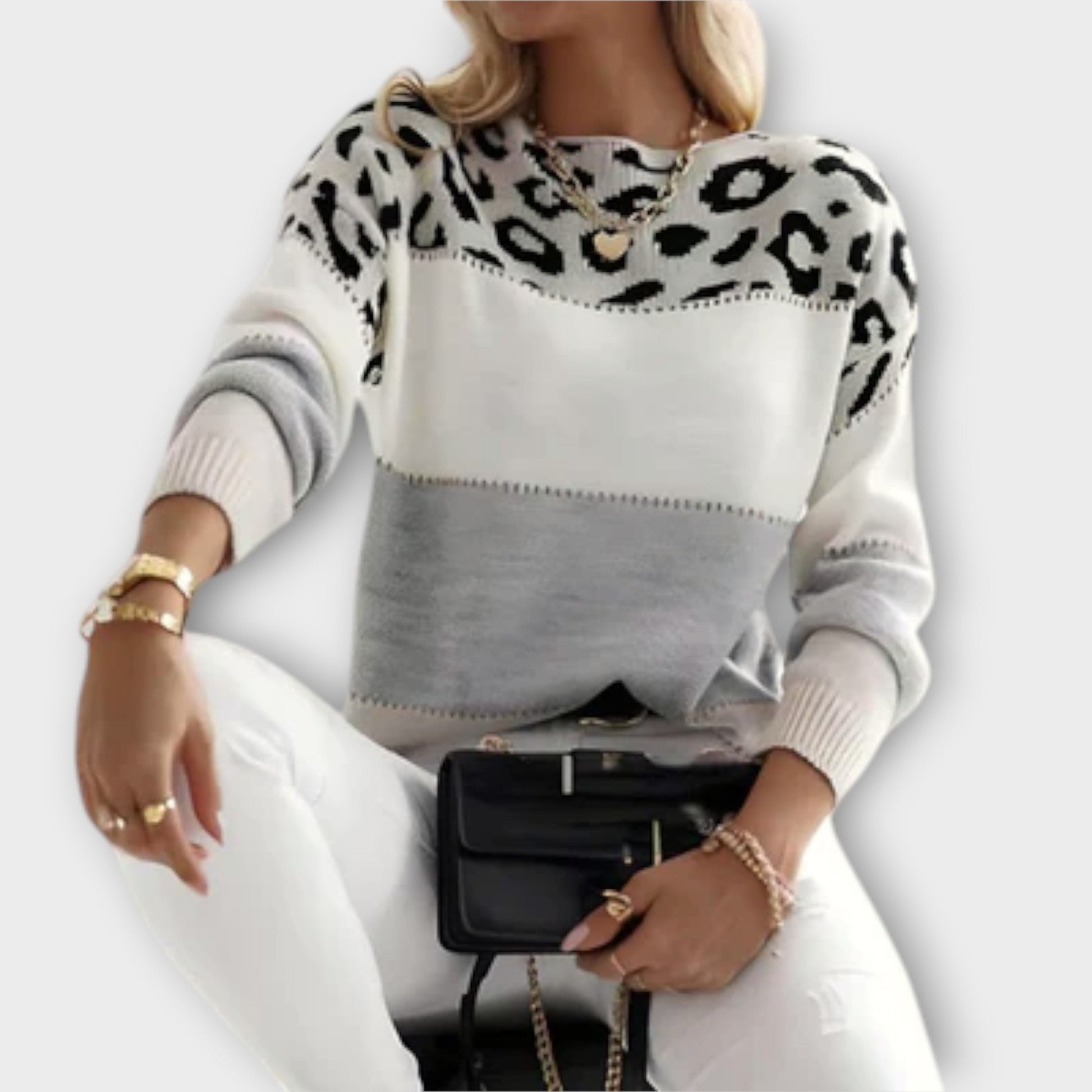 Elegant women's long-sleeve knit sweater with a stylish panther print, perfect for cozy winter wear.