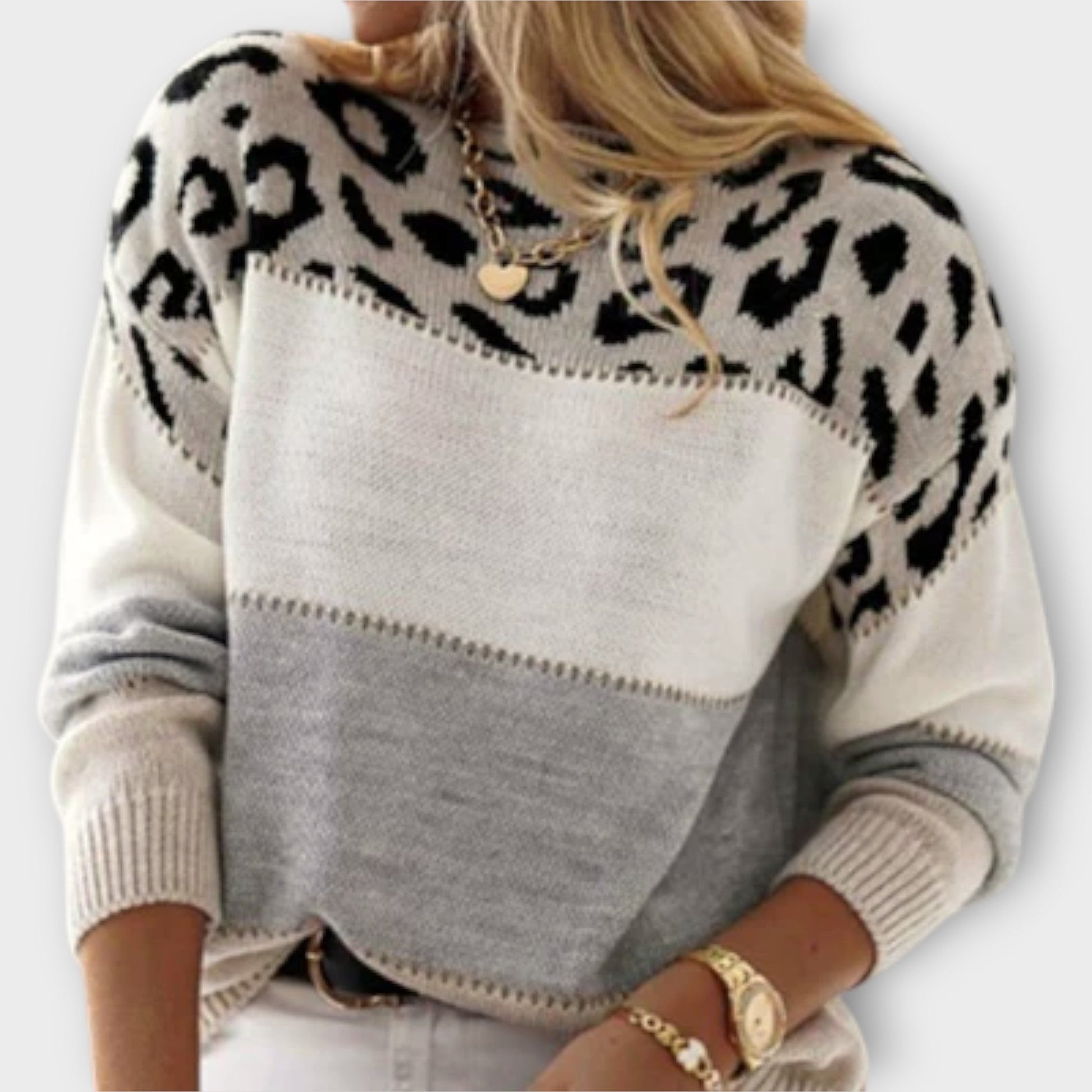 Cozy women's long-sleeve knit sweater with a unique panther print, great for casual winter style.