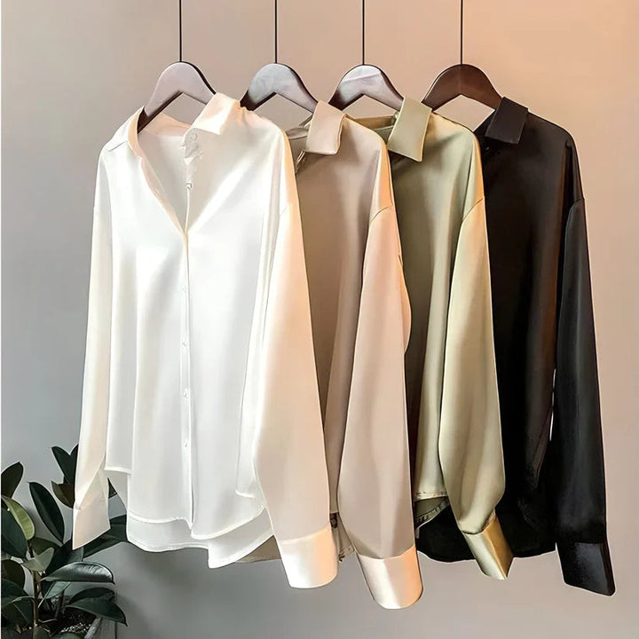 Professional women's work blouse, long sleeve, offering a comfortable loose fit for the office.