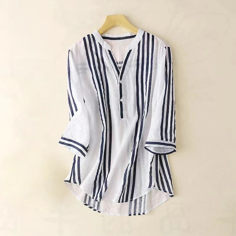 Elegant women's long sleeve striped button-down shirt, perfect for work or casual summer fashion. Classic & versatile.