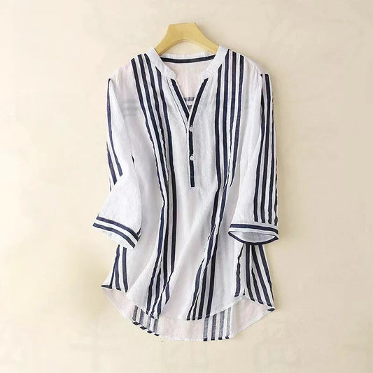 Elegant women's long sleeve striped button-down shirt, perfect for work or casual summer fashion. Classic & versatile.