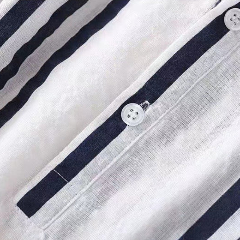 Classic striped long sleeve button-down shirt for women. Elegant & sophisticated, ideal for versatile casual or work outfits.
