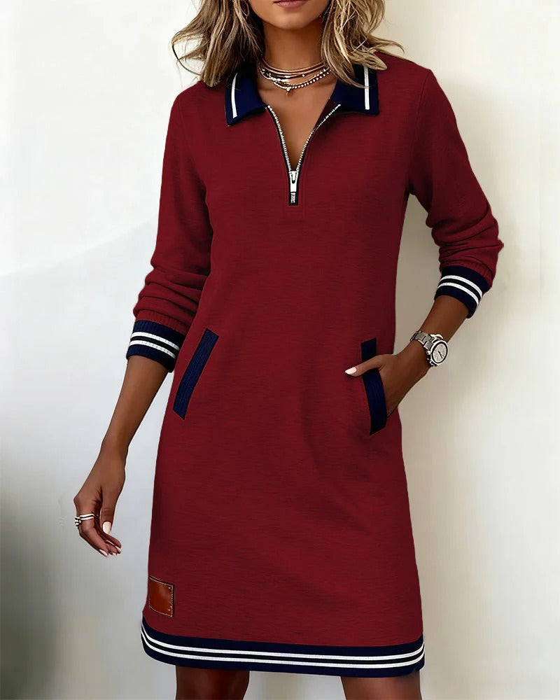 Women's long sleeve tunic dress, elegantly styled with boots, versatile for fall & winter fashion.