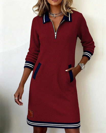 Women's long sleeve tunic dress, elegantly styled with boots, versatile for fall & winter fashion.