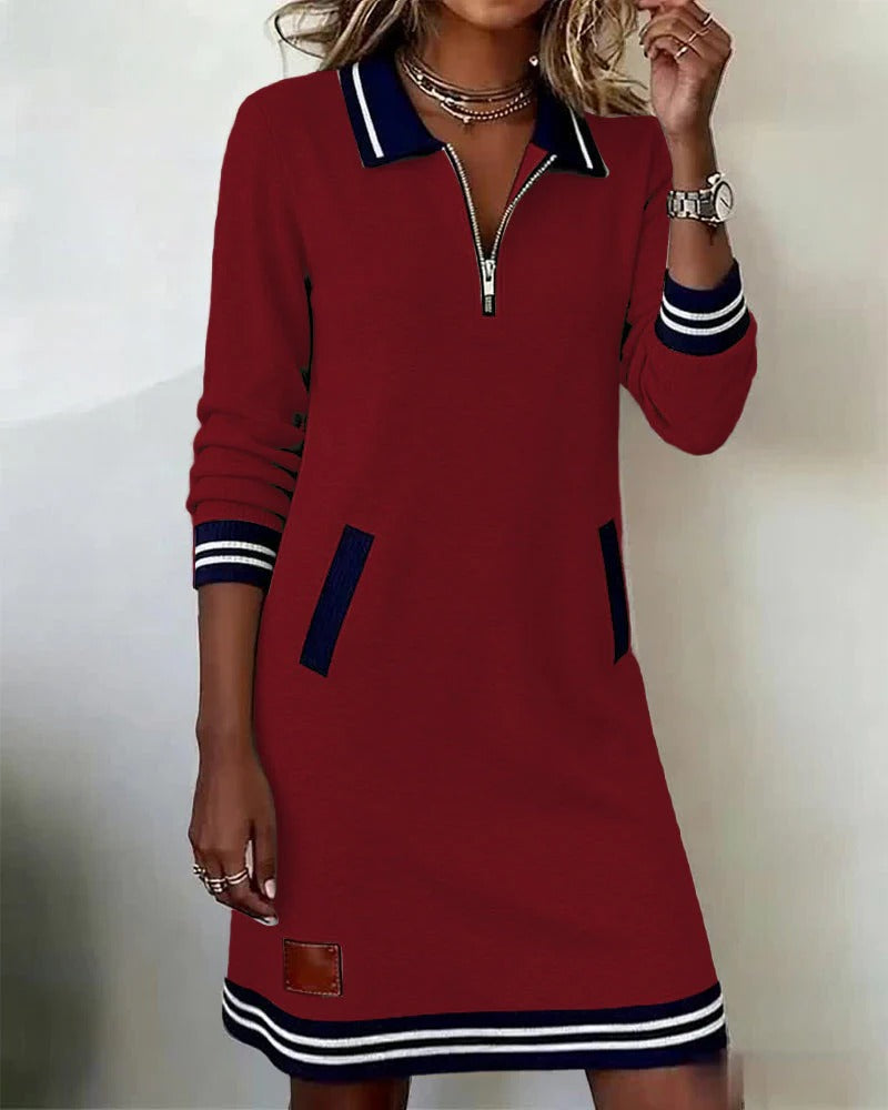 Comfortable women's long sleeve tunic dress, flat lay showcasing elegant design for everyday & work.