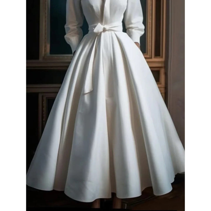 Sophisticated women's long sleeve A-line midi dress featuring a flattering V-neck, perfect for elegant occasion wear.