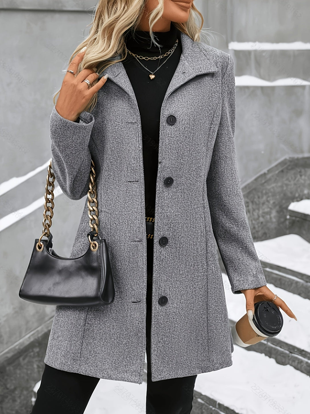 Elegant women's longline coat with a chic notch collar, perfect for sophisticated winter fashion.